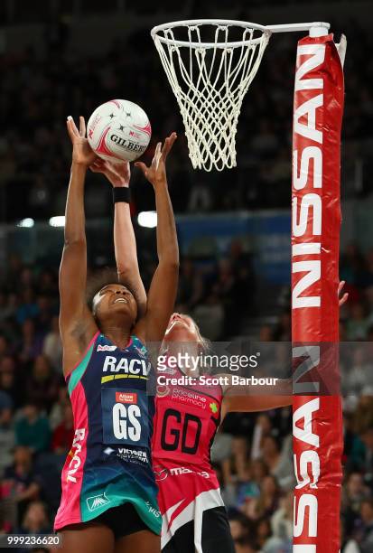 Mwai Kumwenda of the Vixens and Leana de Bruin of the Thunderbirds compete for the ball during the round 11 Super Netball match between the Vixens...