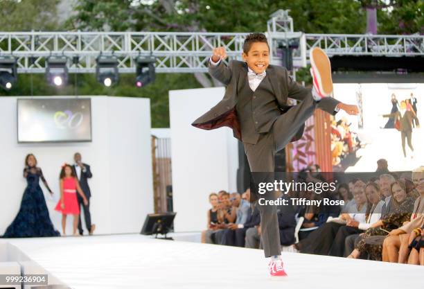 Robinson family walks the runway at the HollyRod 20th Annual DesignCare at Cross Creek Farm on July 14, 2018 in Malibu, California.