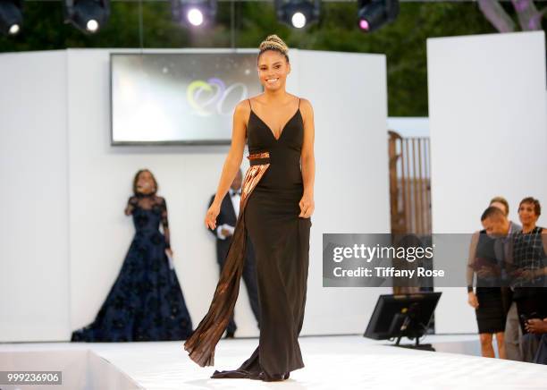 Robinson family walks the runway at the HollyRod 20th Annual DesignCare at Cross Creek Farm on July 14, 2018 in Malibu, California.