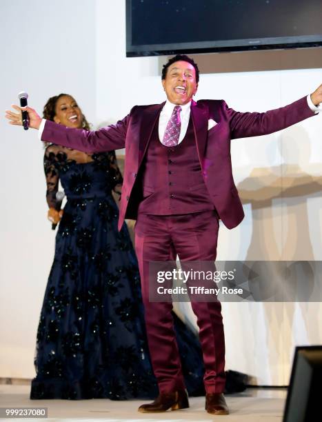 Holly Robinson Peete and Smokey Robinson attend the HollyRod 20th Annual DesignCare at Cross Creek Farm on July 14, 2018 in Malibu, California.