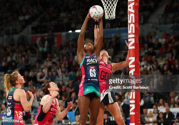 Mwai Kumwenda of the Vixens and Leana de Bruin of the Thunderbirds compete for the ball during the round 11 Super Netball match between the Vixens...
