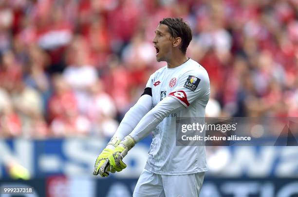 Goalkeeper Rene Adler of Mainz gestures during the German Bundesliga soccer match between FSV Mainz 05 and Hannover 96 in the Opel Arena in Mainz,...