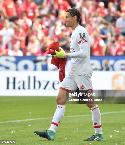 Goalkeeper Rene Adler of Mainz walks across the pitch during the German Bundesliga soccer match between FSV Mainz 05 and Hannover 96 in the Opel...