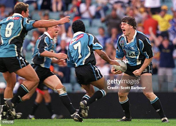 Martin Lang of the Sharks celebrates after scoring a try during the NRL second semi final match between the Bulldogs and the Cronulla Sharks held at...