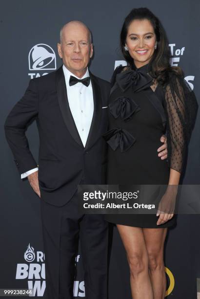 Actor Bruce Willis and wife Emma Heming arrive for the Comedy Central Roast Of Bruce Willis held at Hollywood Palladium on July 14, 2018 in Los...