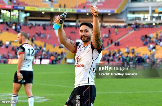 Shaun Johnson of the Warriors celebrates victory with fans after the round 18 NRL match between the Brisbane Broncos and the New Zealand Warriors at...