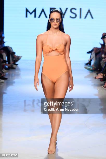 Model walks the runway for Marysia at Miami Swim Week powered by Art Hearts Fashion Swim/Resort 2018/19 at Faena Forum on July 14, 2018 in Miami...