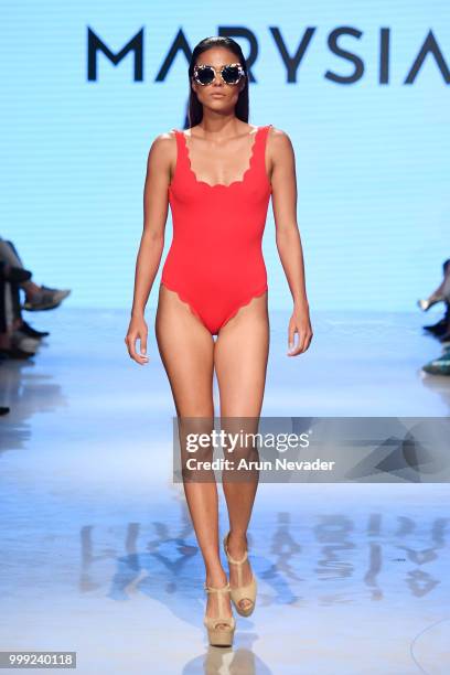 Model walks the runway for Marysia at Miami Swim Week powered by Art Hearts Fashion Swim/Resort 2018/19 at Faena Forum on July 14, 2018 in Miami...