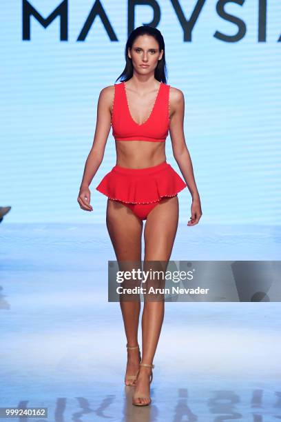 Model walks the runway for Marysia at Miami Swim Week powered by Art Hearts Fashion Swim/Resort 2018/19 at Faena Forum on July 14, 2018 in Miami...