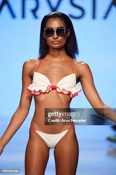 Model walks the runway for Marysia at Miami Swim Week powered by Art Hearts Fashion Swim/Resort 2018/19 at Faena Forum on July 14, 2018 in Miami...