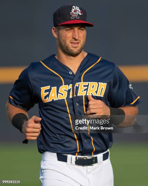 Tim Tebow of the Eastern Division All-Stars warming up and stretching before the 2018 Eastern League All Star Game at Arm & Hammer Park on July 11,...