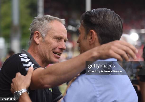 Freiburg's manager Christian Streich and Frenkfurt's manager Niko Kovac ahead of the German Bundesliga soccer match between SC Freiburg and Eintracht...