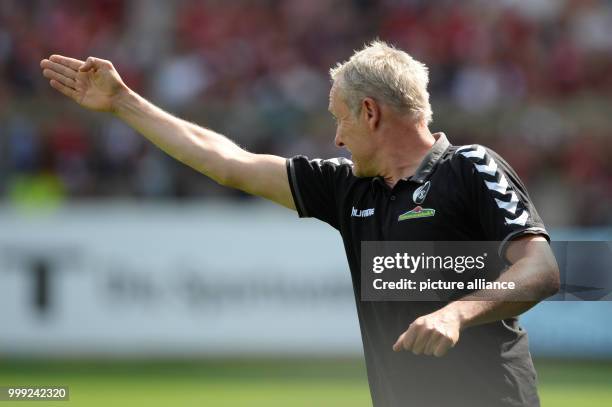 Freiburg's manager Christian Streich on the touchline during the German Bundesliga soccer match between SC Freiburg and Eintracht Frankfurt in the...