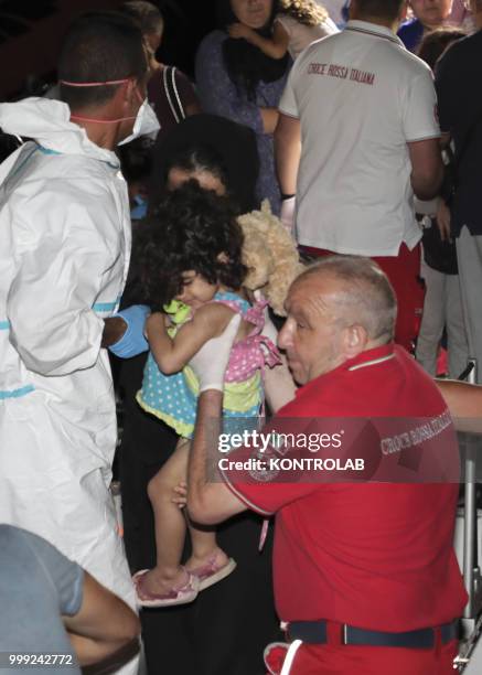 The landing stages of 75 Iraqi Kurdish refugees arrived in the port of Crotone after being intercepted by a patrol boat of the Guardia di Finanza 12...