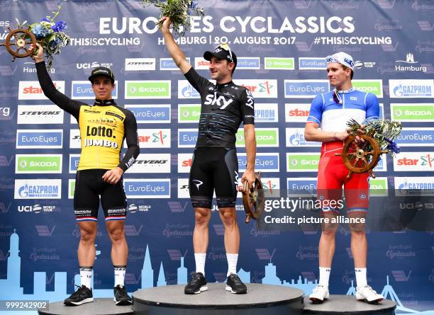 Elia Viviani of Italy celebrates his victory of the Euro Eyes Cyclassics in Hamburg, Germany, 20 August 2017. Arnaud Demare of France came second and...