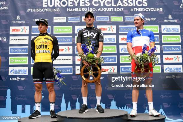 Elia Viviani of Italy celebrates his victory in the Euro Eyes Cyclassics in Hamburg, Germany, 20 August 2017. Arnaud Demare of France came second and...