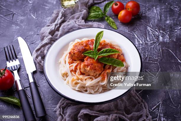 spaghetti pasta with meatballs and tomato sauce. - tomato pasta stock pictures, royalty-free photos & images
