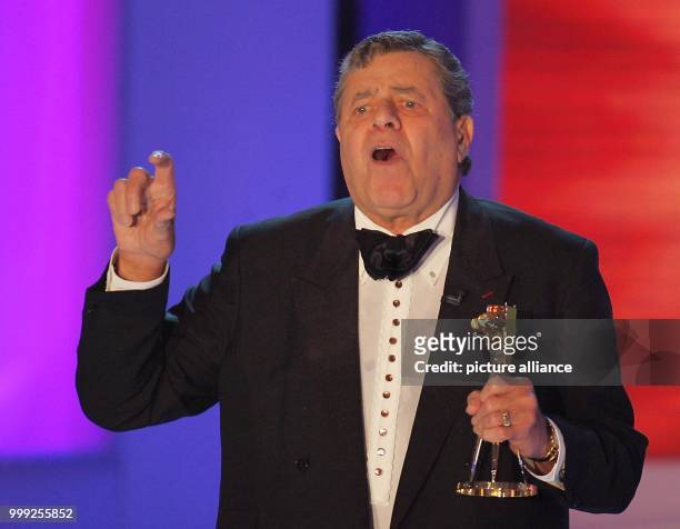 File picture dated 09 February 2005 shows US comic Jerry Lewis receiving the Goldene Kamera award for his lifetime achievement, in Berlin, Germany....