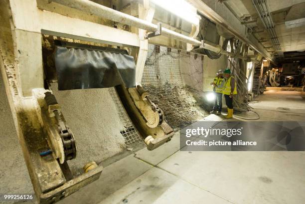 Tunnel boss Konrad Bergmeister speaking to a dpa journalist under the tunnel drilling machine in a section of construction site for the Brenner Base...