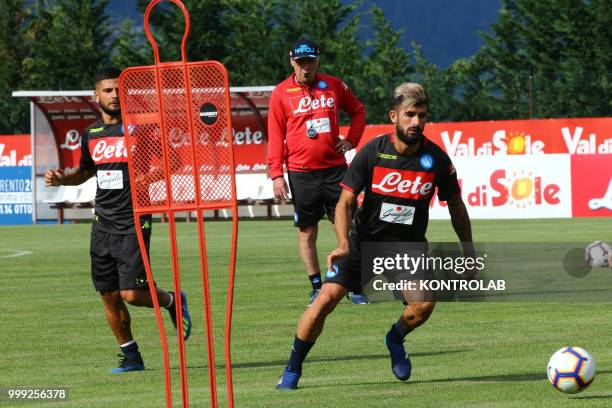 Napoli's Italian coach Carlo Ancelotti looks at Napoli's Albanian defender Elseid Hysaj and Napoli's Italian striker Lorenzo Insigne during the...