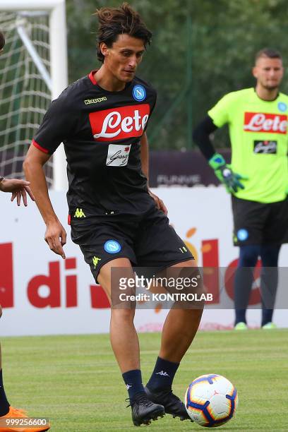 Napoli's Italian striker Roberto Inglese is training during the pre-season praparation on July 13 2018 at Carciato pitch.