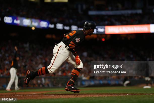 Andrew McCutchen of the San Francisco Giants runs towards first base during the fourth inning against the Oakland Athletics at AT&T Park on July 14,...