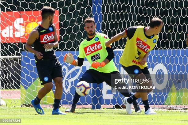 Napoli's Greek goalkeeper Orestis Karnezis deviates the ball during the pre-season praparation on July 13 2018 at Carciato pitch.