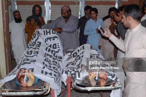 The dead bodies of victims laid out for transfer to a hospital. A suicide bombing attack on Balochistan Awami Party corner meeting at Mastang...