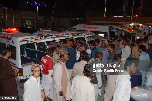 Rescue worker shifting the injured and dead bodys to a hospital. A suicide bombing attack on Balochistan Awami Party corner meeting at Mastang...
