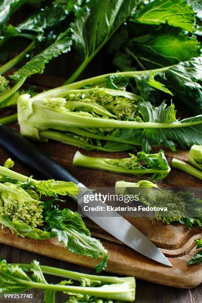 turnip greens - brassica rapa stock pictures, royalty-free photos & images