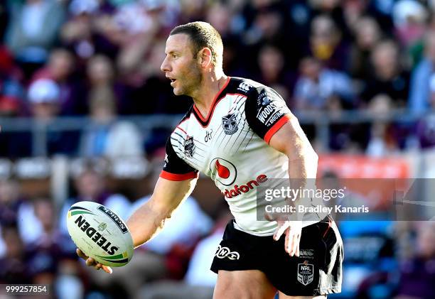Blake Green of the Warriors passes the ball during the round 18 NRL match between the Brisbane Broncos and the New Zealand Warriors at Suncorp...