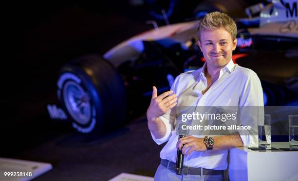 Formula 1 World Champion Nico Rosberg speaks during the installation of his world championship car into the Mercedes-Benz Musuem in Stuttgart,...