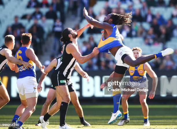 Nic Naitanui of the Eagles competes for the ball against Brodie Grundy of the Magpies during the round 17 AFL match between the Collingwood Magpies...