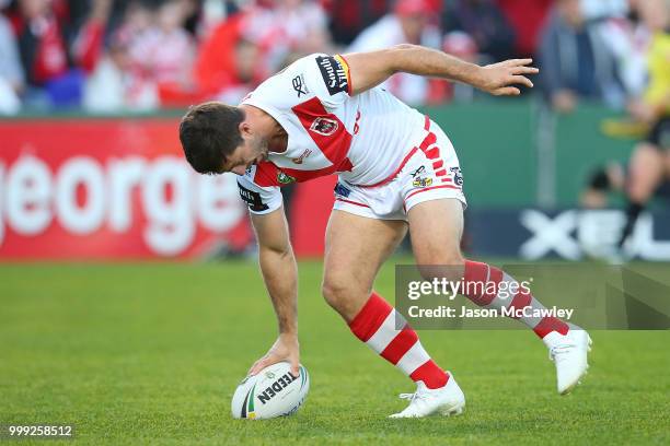 Ben Hunt of the Dragons scores a try during the round 18 NRL match between the St George Illawarra Dragons and the Wests Tigers at UOW Jubilee Oval...