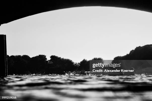 Athletes perform in the swim leg of the age group olympic distance race on July 15, 2018 in Hamburg, Germany.