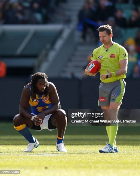 Nic Naitanui of the Eagles looks on during the 2018 AFL round 17 match between the Collingwood Magpies and the West Coast Eagles at the Melbourne...