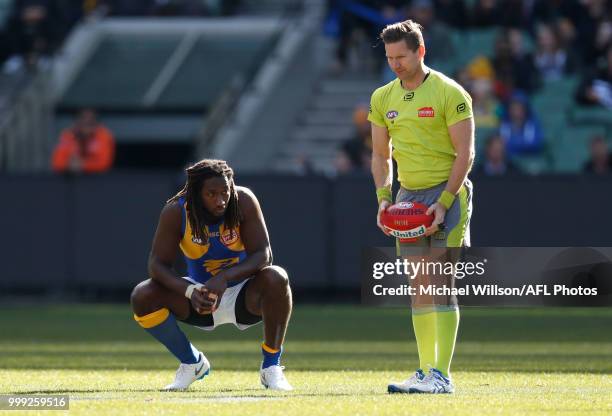 Nic Naitanui of the Eagles looks on during the 2018 AFL round 17 match between the Collingwood Magpies and the West Coast Eagles at the Melbourne...