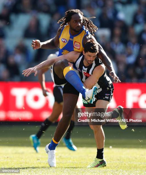 Nic Naitanui of the Eagles and Scott Pendlebury of the Magpies compete for the ball during the 2018 AFL round 17 match between the Collingwood...