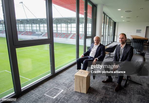 Hermann Gerland and Jochen Sauer, the heads of the new youth training centre sitting in a lounge of the football stadium at the new Bayern Munich...