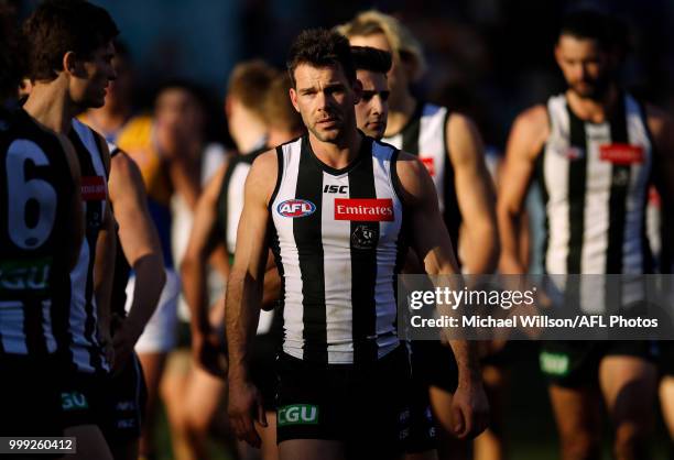 Levi Greenwood of the Magpies looks dejected after a loss during the 2018 AFL round 17 match between the Collingwood Magpies and the West Coast...