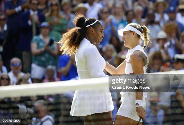 Angelique Kerber of Germany and Selena Williams of the United States praise each other after their Wimbledon final match in London on July 14, 2018....