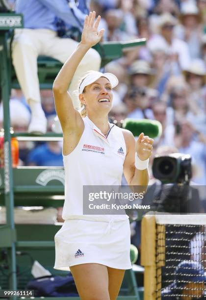 Angelique Kerber of Germany acknowledges the crowd after winning 6-3, 6-3 against Selena Williams of the United States in the women's singles final...