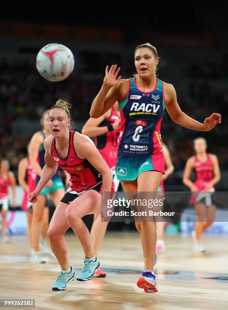 Kate Moloney of the Vixens and Hannah Petty of the Thunderbirds compete for the ball during the round 11 Super Netball match between the Vixens and...