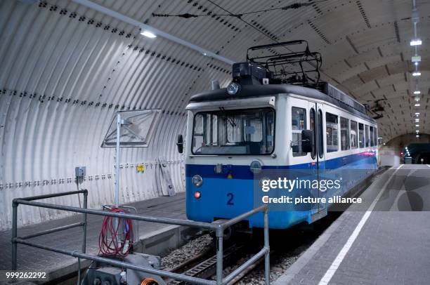 Cog railway train of the Bayerische Zugspitzbahn serving the Zugspitze mountain at the Zugspitzplatt station in Grainau, Germany, 19 August 2017....