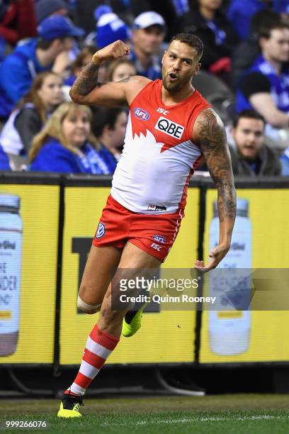 Lance Franklin of the Swans celebrates kicking a goal during the round 17 AFL match between the North Melbourne Kangaroos and the Sydney Swans at...