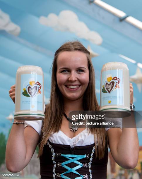 Isabelle presents the official Oktoberfest 2017 beer tankard at a press conference in Munich, Germany, 22 August 2017. The festival opens on the 16...