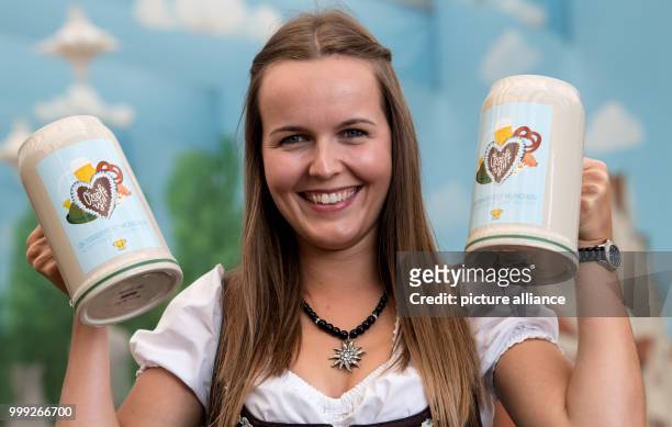 Isabelle presents the official Oktoberfest 2017 beer tankard at a press conference in Munich, Germany, 22 August 2017. The festival opens on the 16...