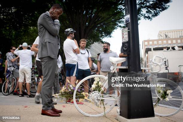 Cyclists pay their respects at a make shift memorial at the intersections of 21st, M street and New Hampshire, where Jefrrey Hammond Long was killed...