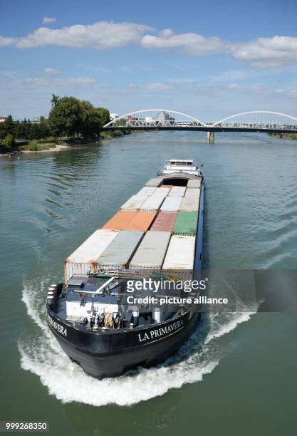 The container barge La Primavera passes Kehl, Germany, 22 August 2017. Goods are currently being transported on barges on the Rhine that would...