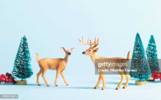 christmas holiday theme with reindeer - animal representation stock pictures, royalty-free photos & images